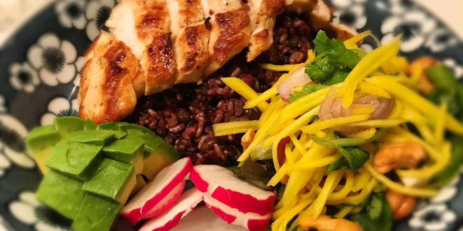 chicken entree with avocado and radishes.